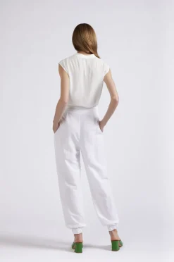 pantaloni con bottoni a vista ed elastico alla caviglia bianco