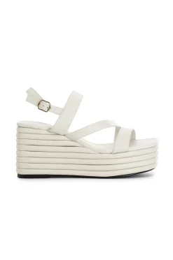 sandali asimmetrici in nappa con zeppa effetto imbottito panna